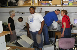 Students and trainers working in the shop